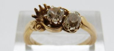 An 18ct gold ring set with two old cut diamonds, the largest approximately 0.35ct, size O, 5.