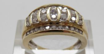 A 14ct gold ring set with round cut diamonds, size N, 5.