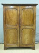 A 19thC panelled mahogany wardrobe opening to reveal hanging space and single drawer,