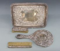 A Victorian embossed hallmarked silver dressing table tray, Chester 1899 maker William Aitken,