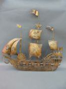 A large metal and wood wall plaque in the form of a galleon, possibly ex pub sign,