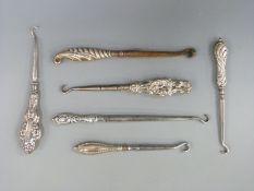 Six various hallmarked silver handled button hooks