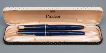 Parker Junior fountain pen set with blue resin barrel and cap, gold plated mounts and 14ct gold nib,