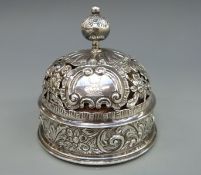 A Victorian hallmarked silver table or desk bell with turn to ring action and marked patent 4901,