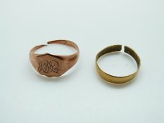 A 22ct gold wedding band (2g) and a 9ct gold signet ring (3g)
