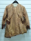 A Victorian/Edwardian jacket and skirt in stipid silk with contrasting lace trim two piece dress