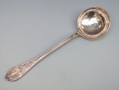 A silver plated ladle marked 800, length 31cm,
