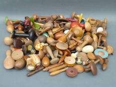 Approximately 70 19th and 20thC turned wood/treen darning or sewing mushrooms and eggs including