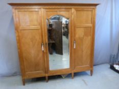 A Biedermeier ash wardrobe having parquetry inlaid decoration,