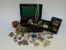 A leather jewellery box with lift out tray containing sterling silver pendant with cabochon