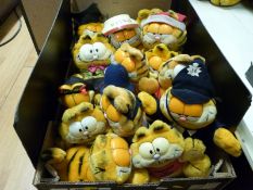 Fifteen Garfield soft toys including Policeman, Graduate, Pasta Lover,