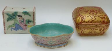 A Chinese bowl with famille rose decoration on an aqua ground, marked to base,