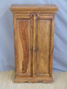 An Eastern hardwood two door cupboard, W51.