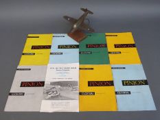 A wooden model of a Gloster Meteor jet aircraft W4041/G and a quantity of Gloster's house magazine