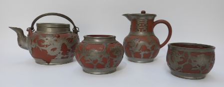 A Chinese Yixing and pewter tea set impressed to base to base Wei Hai Wei