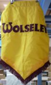 A Wolseley showroom or similar banner,