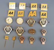 Twenty one cap badges,