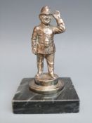 A policeman car mascot with lamp to belt,