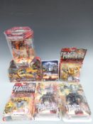 Six signed Transformer Toys and a signed DVD,