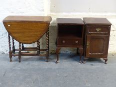 An oak gateleg table and two bedside cabinets