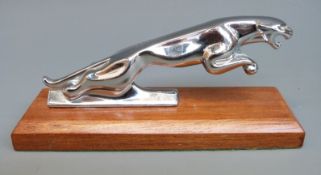 A Jaguar car mascot,