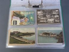 A file of approximately 160 Edwardian postcards topographical, humorous,