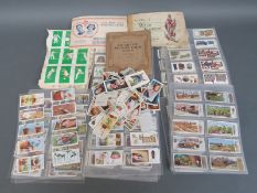 A collection of cigarette cards, some in albums some loose includes tennis, gardening,