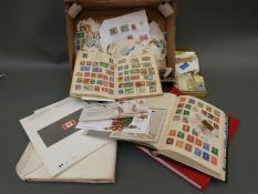 All-world stamps in a Nelson album, a Cadet album,