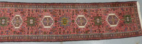 Wool runner on pink ground 276 x 70cm