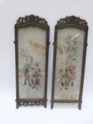 A pair of Chinese hand-painted glass panels in hardwood frames,
