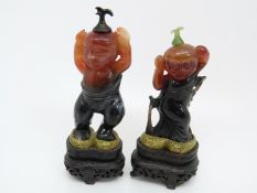 A pair of 19thC Chinese carved multicoloured agate figural scent / perfume bottles in the form of a