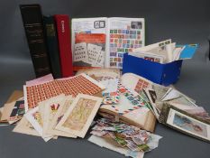 A large Stanley Gibbons philatelic album of world stamps together with sundry other albums and