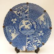 A blue and white Japanese charger in the kraak style with floral decoration,
