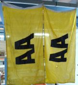Two AA flags with stitched lettering,