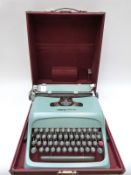 Olivetti Studio 44 typewriter in original case