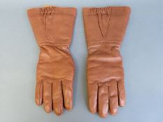 A pair of leather flying gauntlets marked 22C / 1026 and type H.