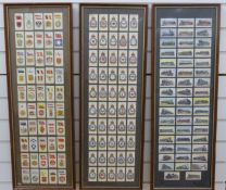 Three framed sets of cigarette cards to include trains,