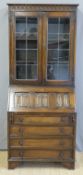 An oak bureau bookcase in the Old Charm style,