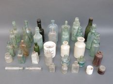 A collection of vintage bottles to include 'Pinkstones Curechiline Cattle Drench',