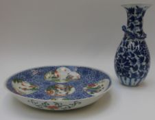 A Chinese blue and white vase with applied lizard to to the neck,