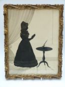 A 19thC silhouette portrait miniature of a lady with table, 27 x 20.