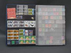 A stockbook of mainly GB stamps including mint blocks,
