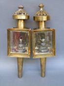 A pair of brass carriage lamps,