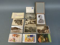 A small album of 21 signed glamour postcards of actresses from the early to mid twentieth century