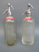 Two soda syphons one Sutton,