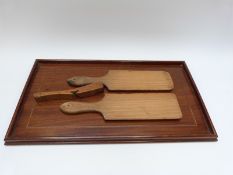 An inlaid wooden tray,