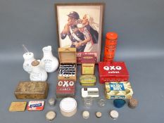 A collection of medical advertising items including inhalers, unopened Elastoplast tins, eye baths,