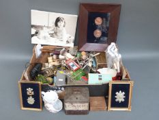 A large collection of advertising ephemera including Camp Coffee tin,