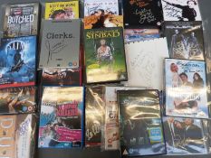 A collection of signed DVDs to include Blues Brothers signed by Carrie Fisher, Gladiator,