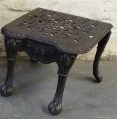 A 19thC cast iron footman and mahogany bidet